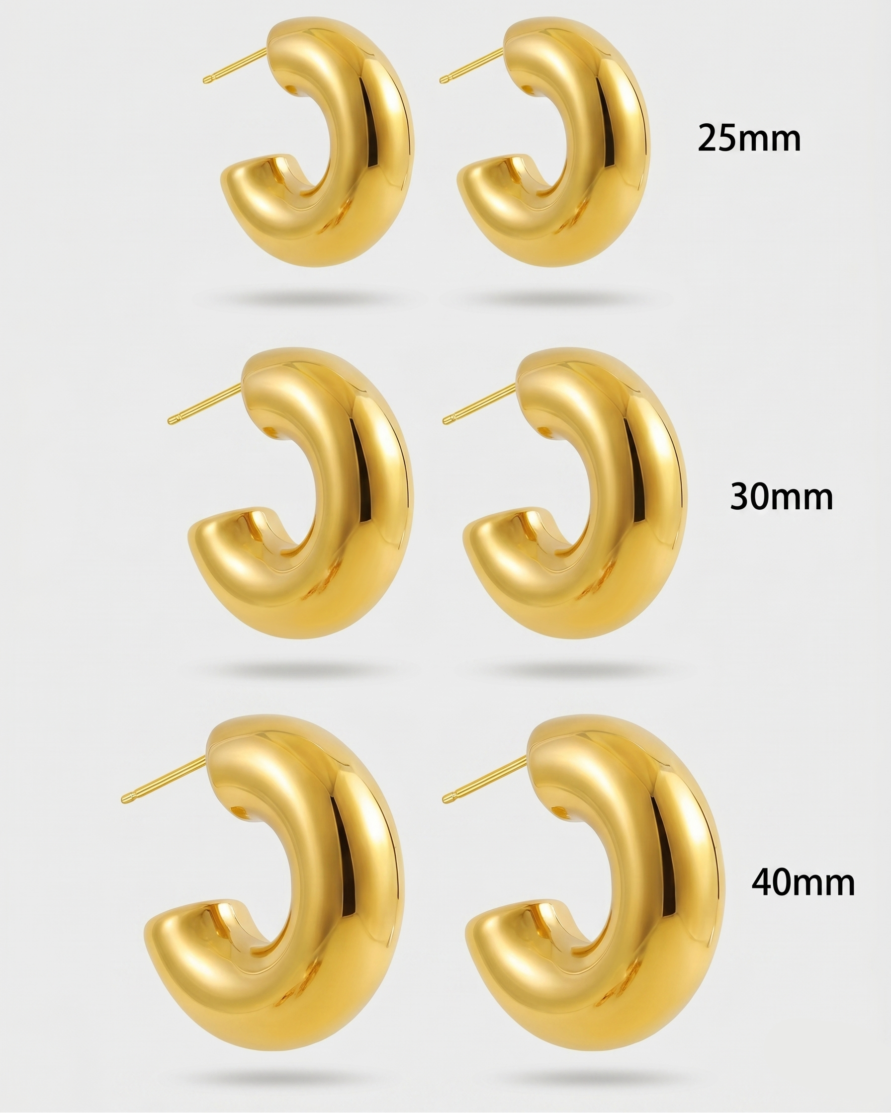 Gold hoop earrings in various sizes on a light gray background