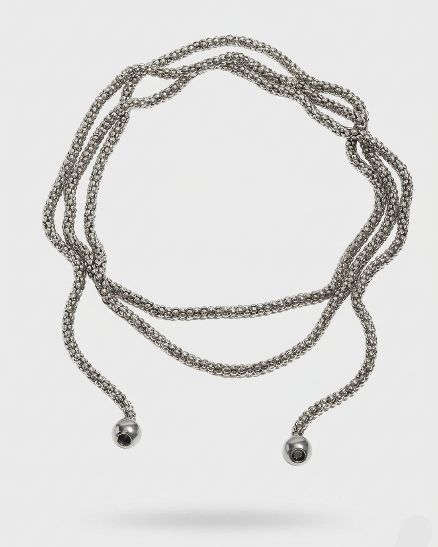 Silver chain necklace on a white background