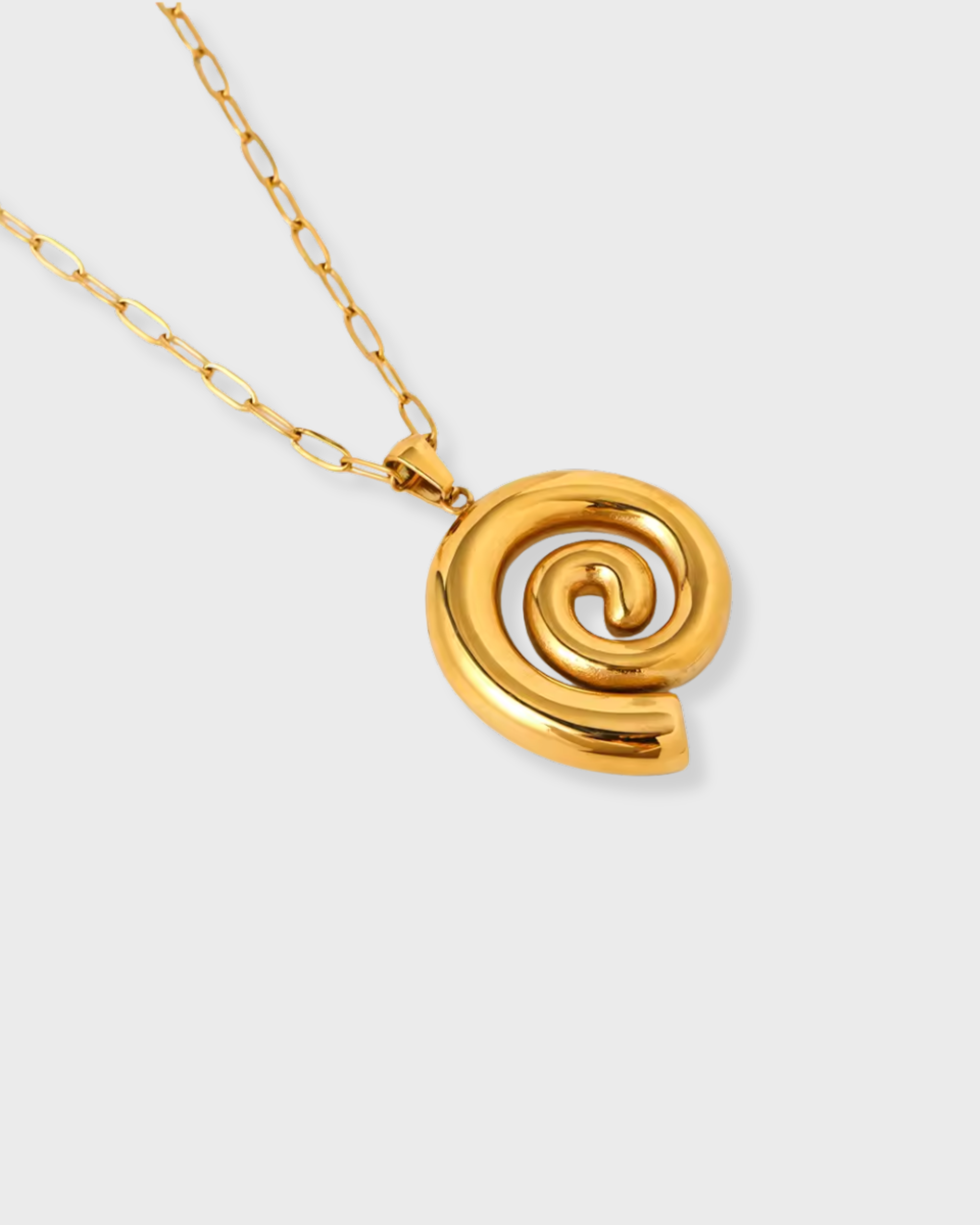 Gold spiral pendant necklace on a white background