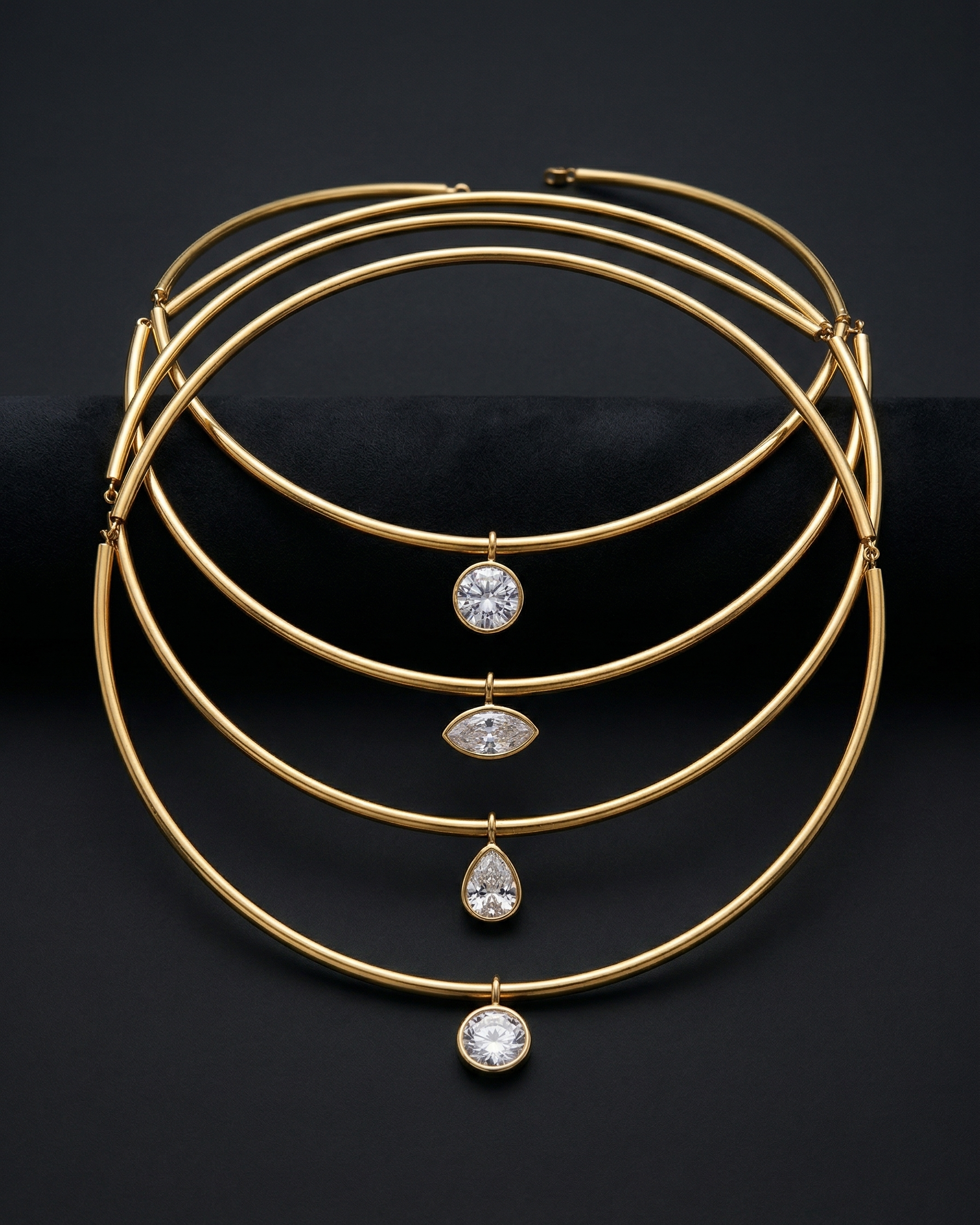Gold choker necklace with embedded diamonds on a dark background