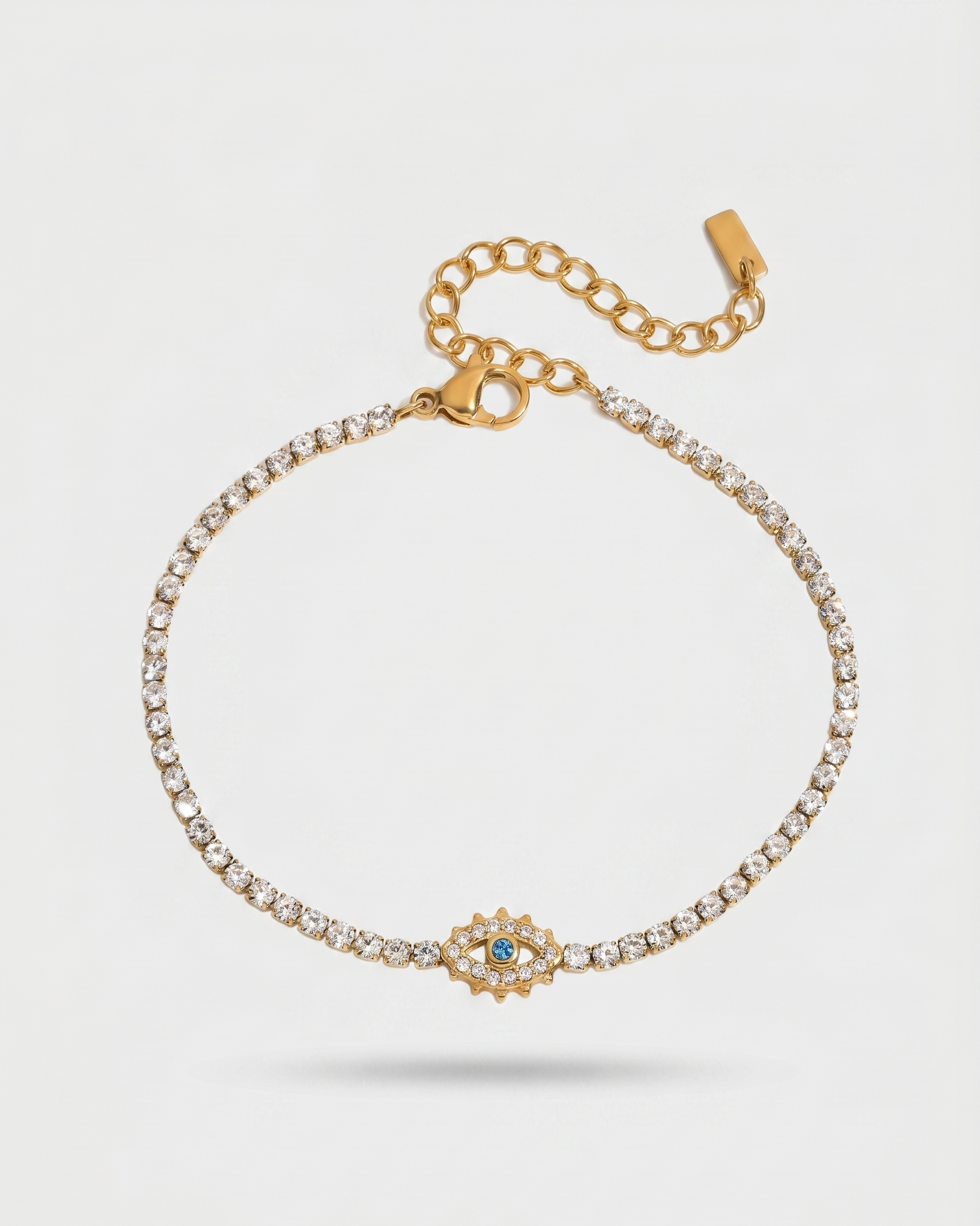 Gold bracelet with diamond accents on a white background