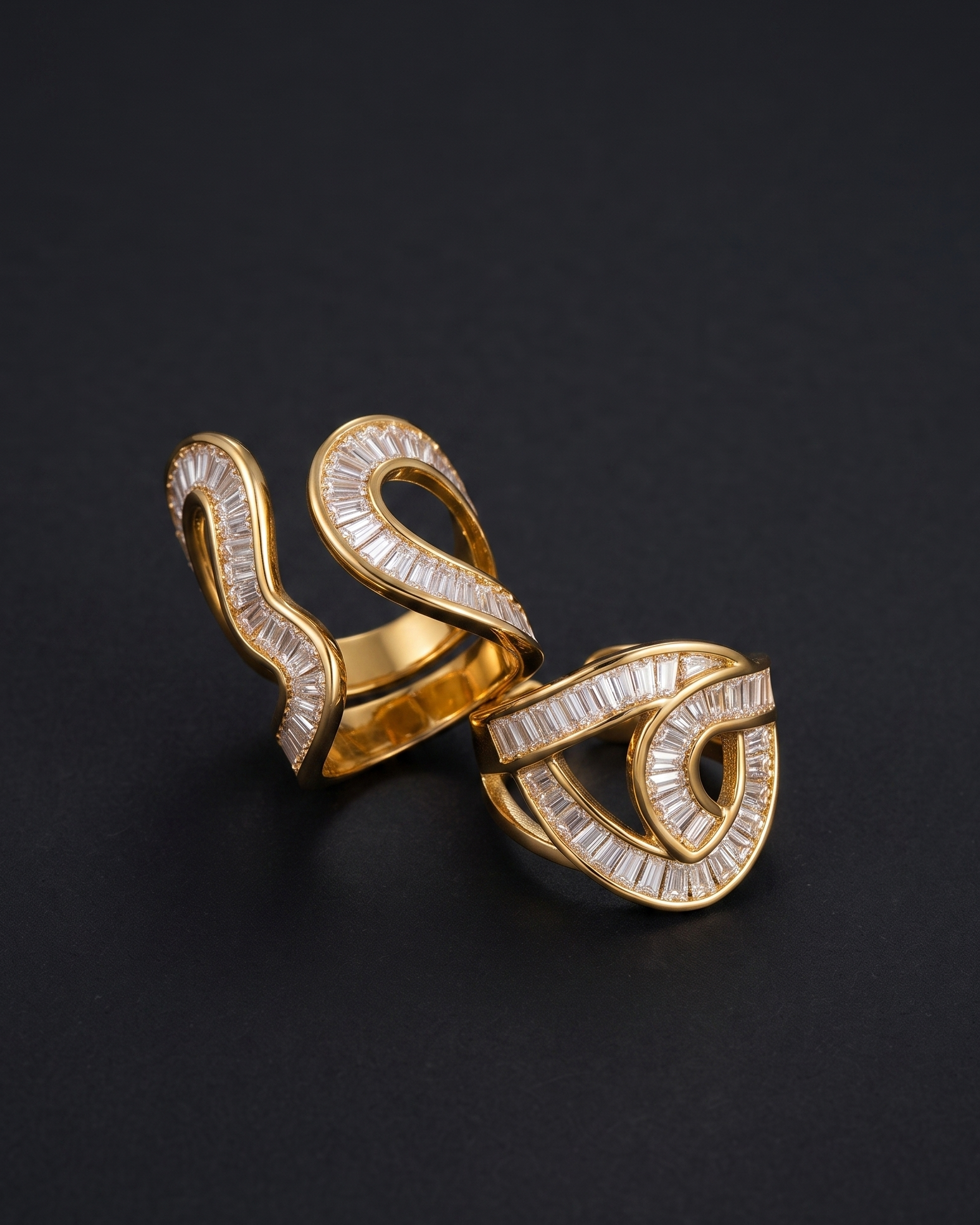 A gold ring with intricate curved bands paved with clear baguette and round-cut stones, displayed on a dark black background.