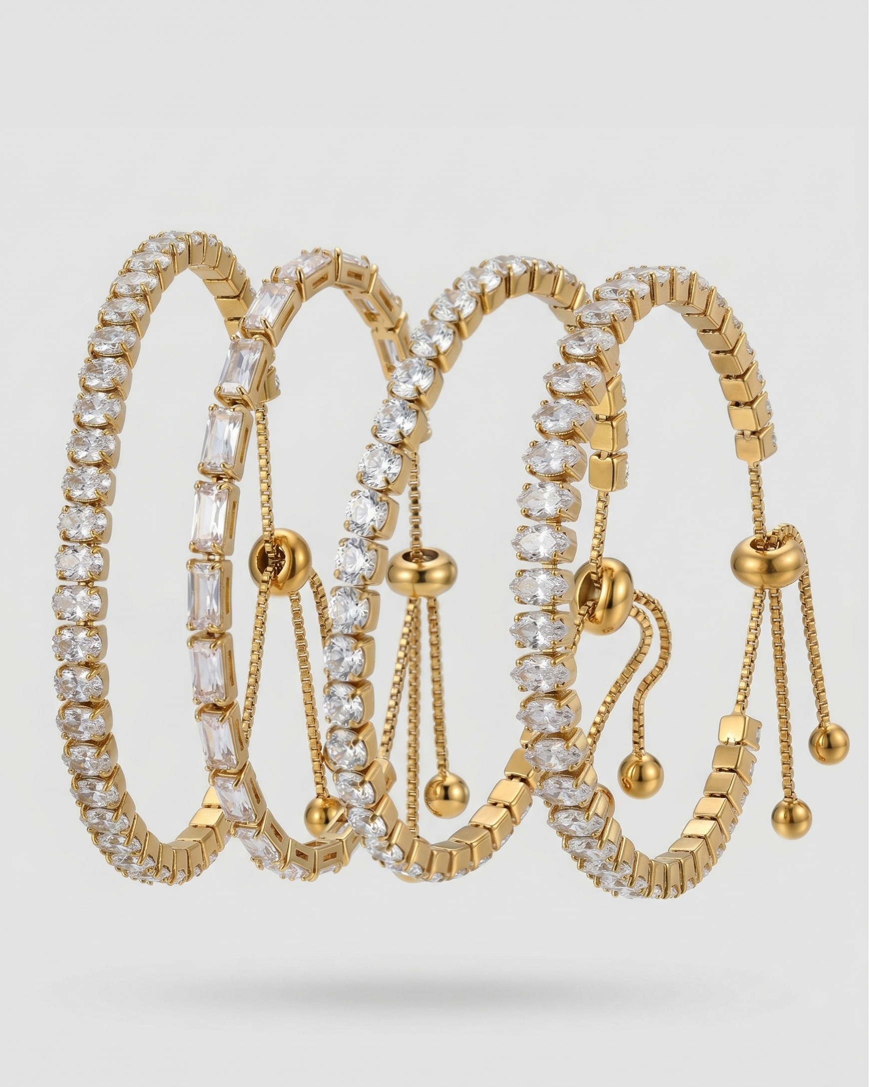 Gold and diamond bracelet on a light gray background