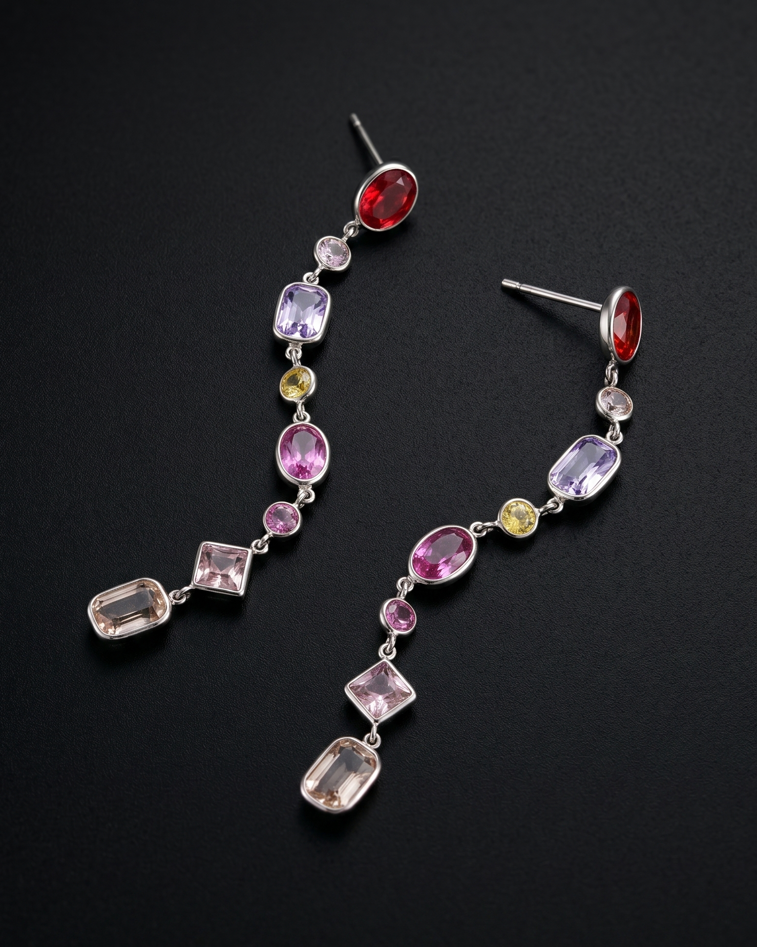 Jewelry set with multicolored gemstones on a dark background