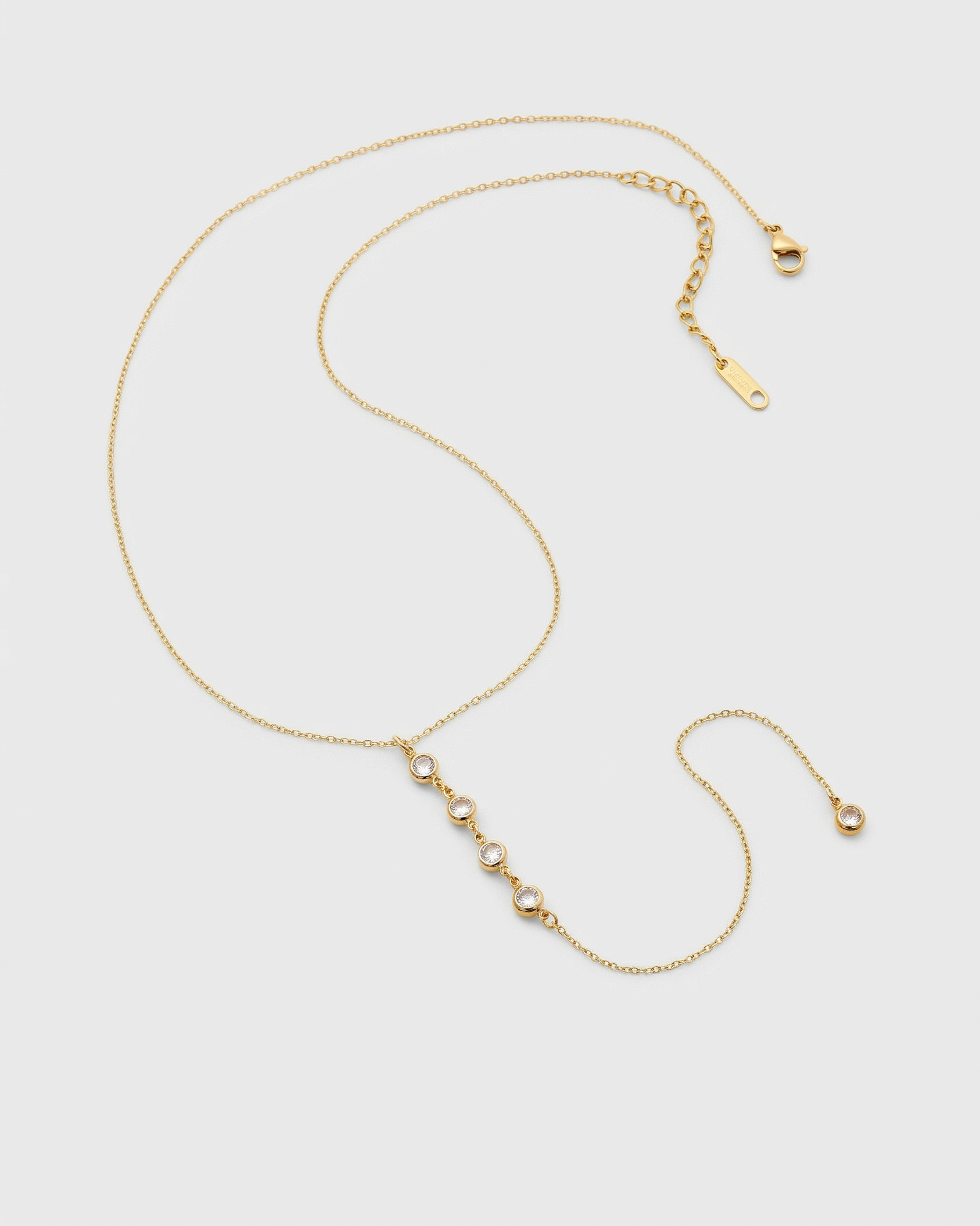Gold necklace on a white background