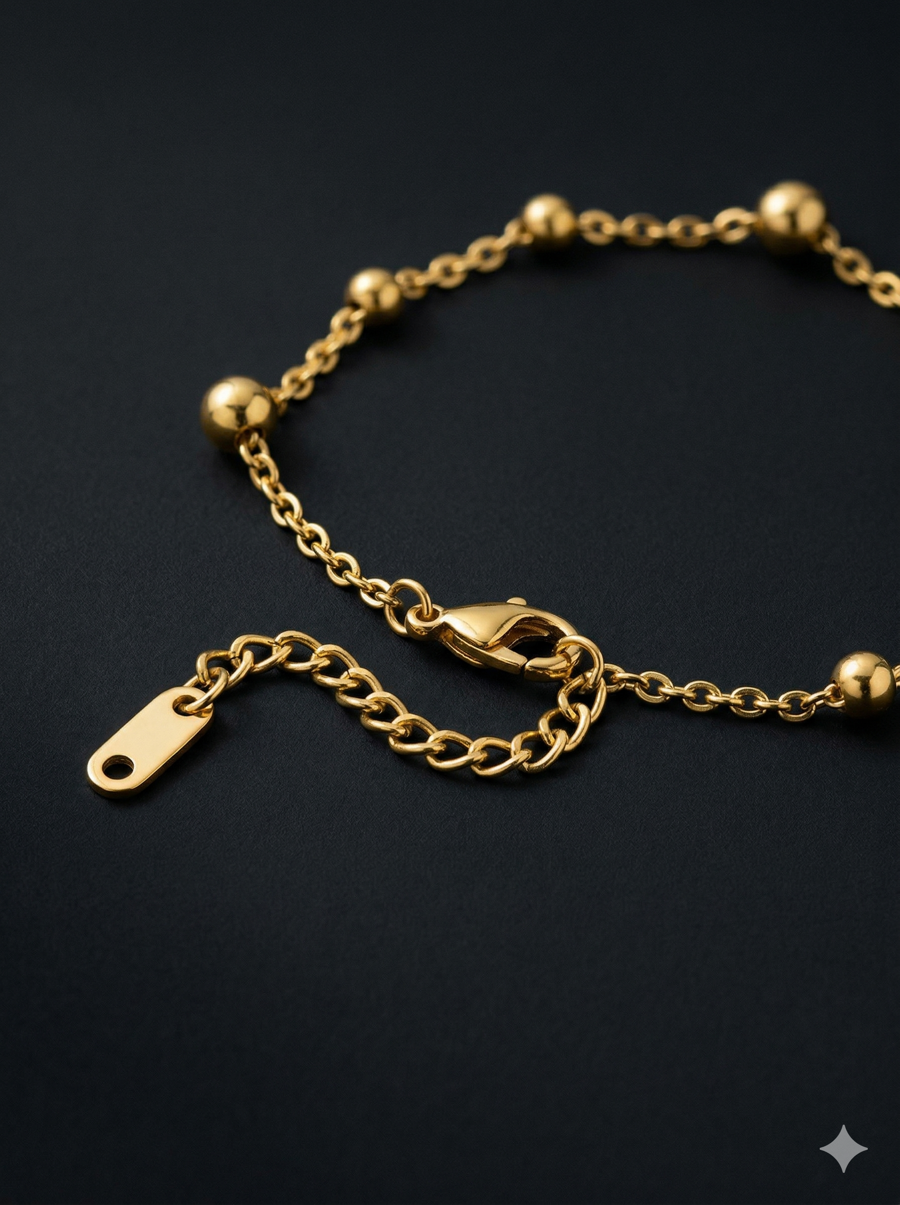 Gold bracelet on a black background