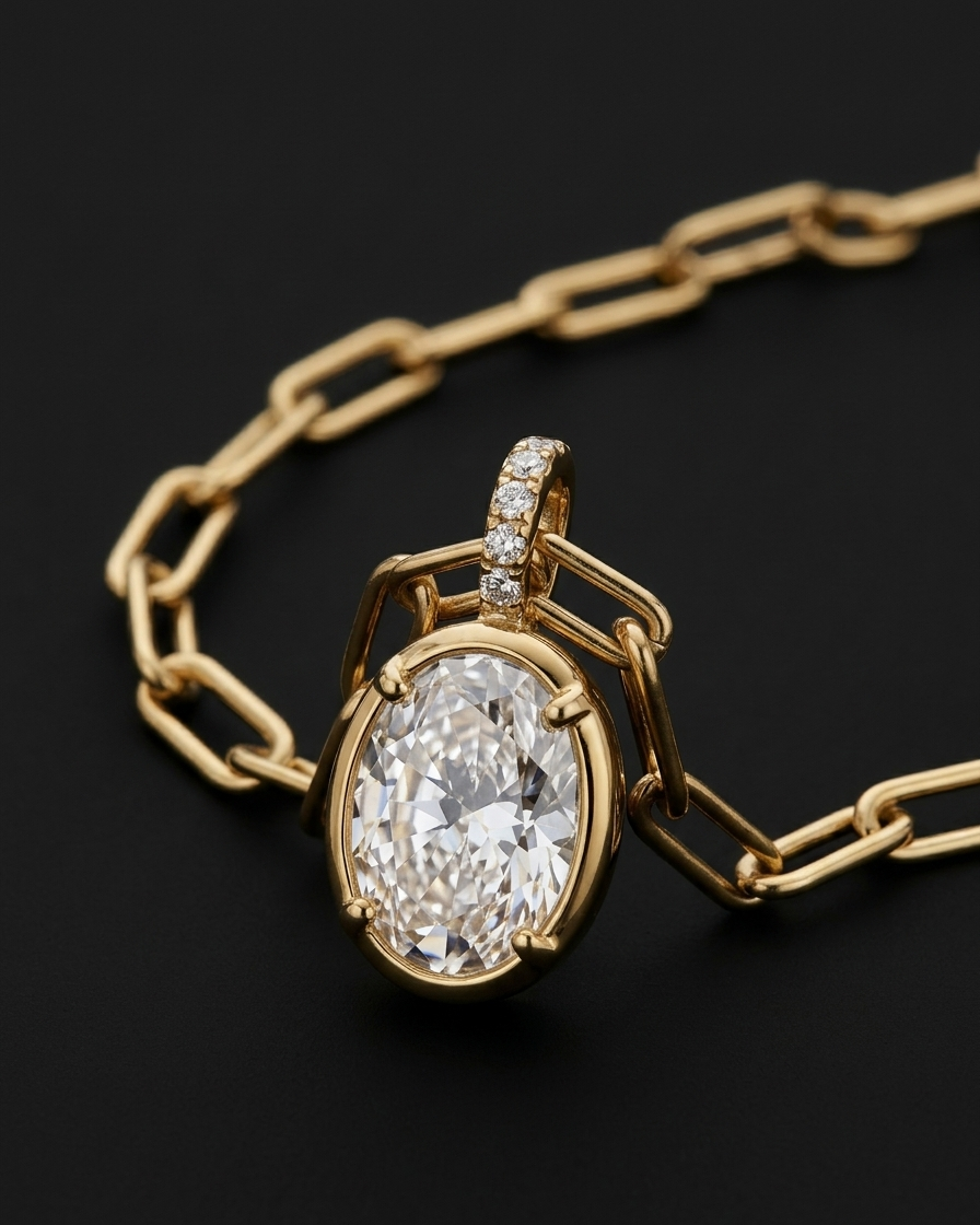 Gold necklace with a diamond pendant on a black background