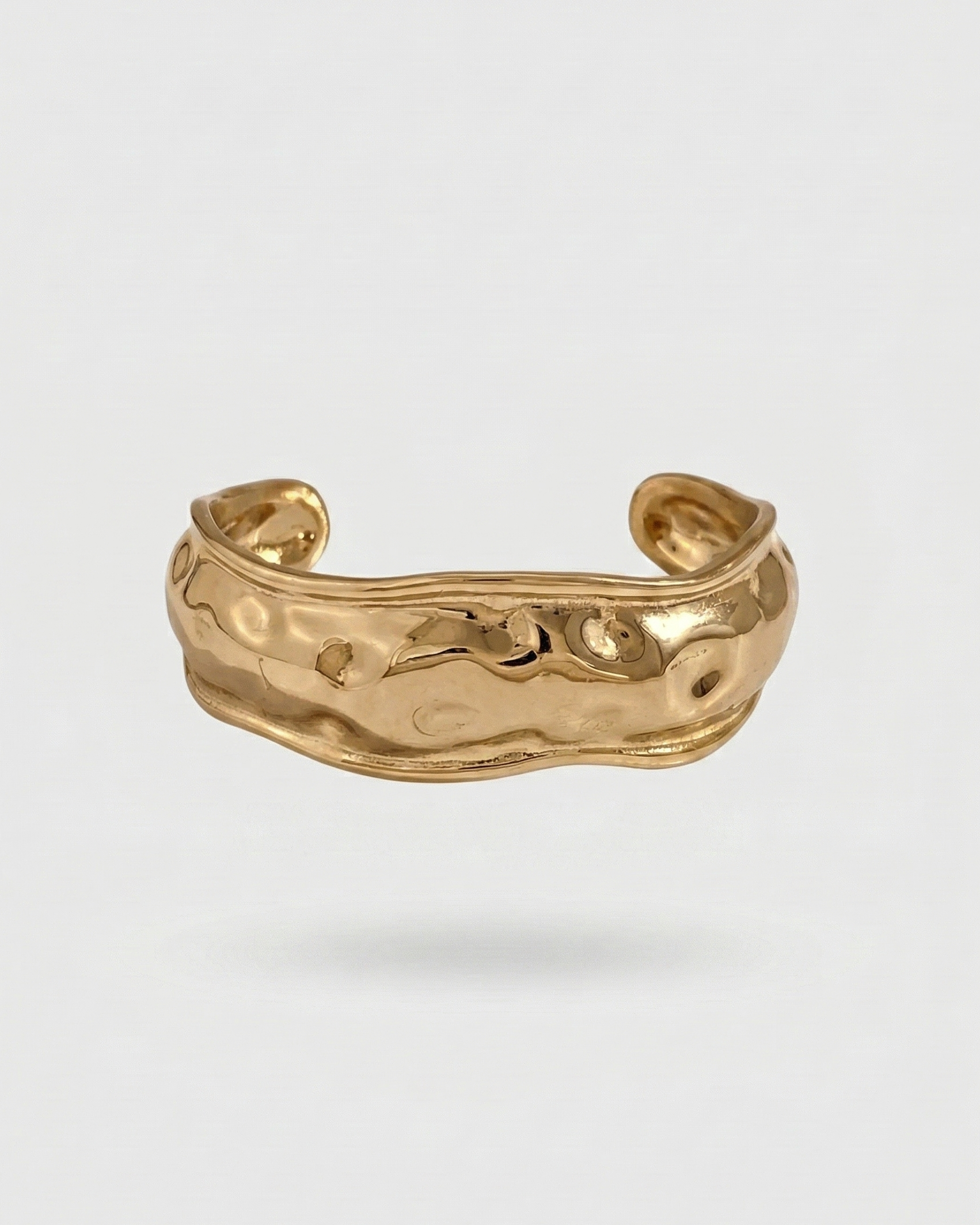 Gold ring on a white background