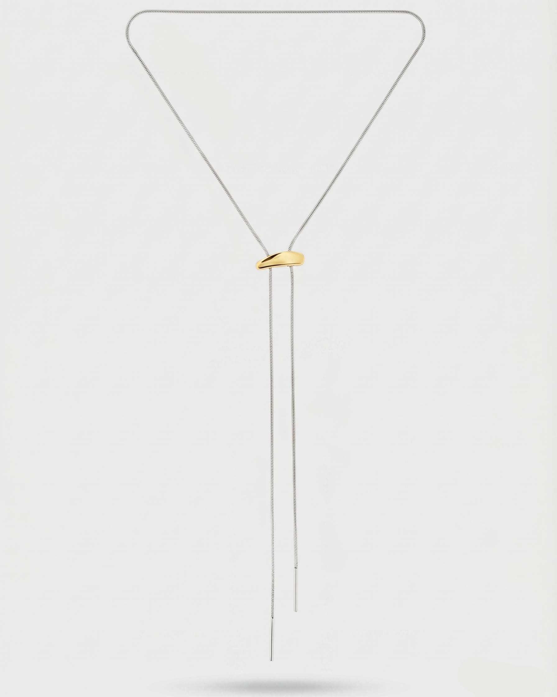 Gold necklace on a white background