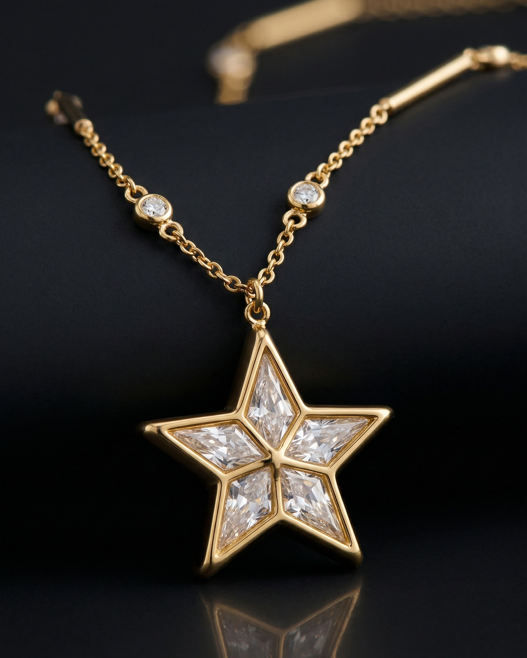 Gold star-shaped necklace with diamond accents on a black background