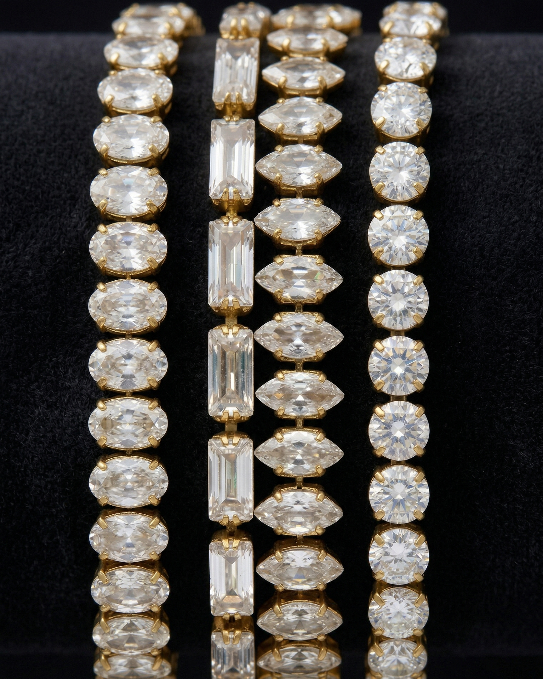 Three diamond bracelets with different stone shapes on a black background